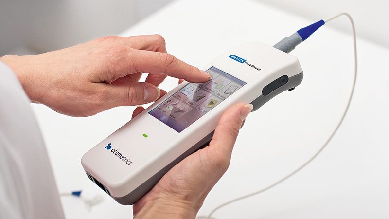Automated Auditory Brainstem Response results shown on Madsen AccuScreen hearing screener screen.