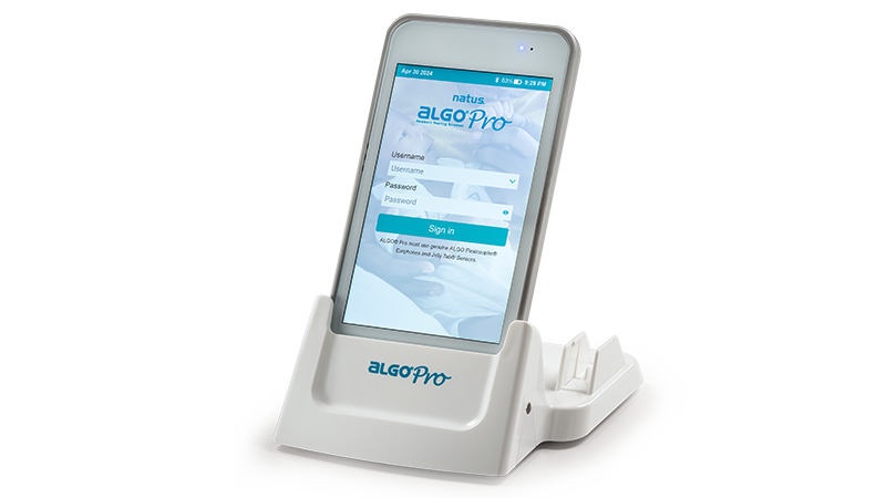ALGO Pro Infant Hearing Screening Device in charging dock, designed for professional newborn hearing screening in healthcare environments.