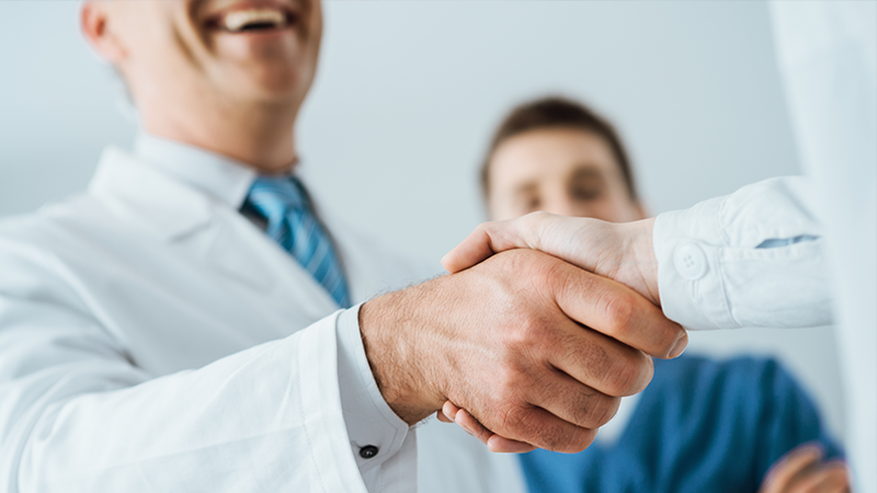 Shaking Hands - Contact Us