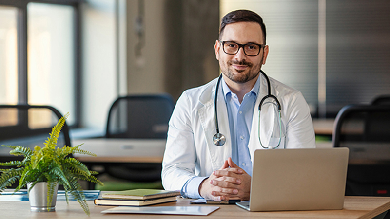 Healthcare provider using digital tools to support newborn screening data management and patient follow-up.