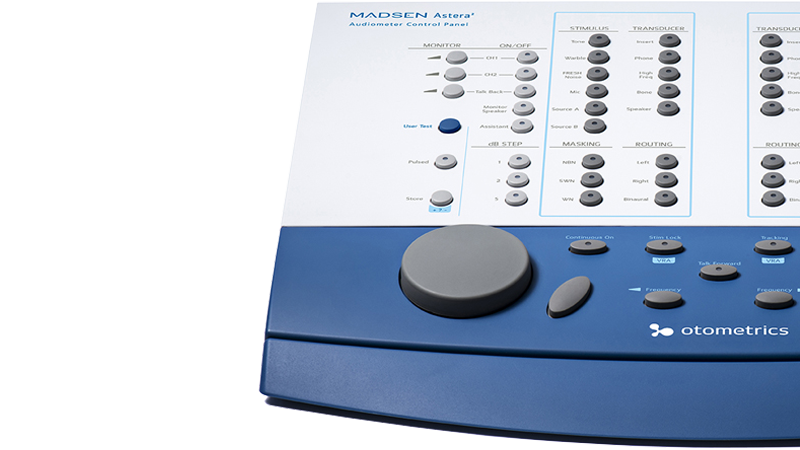 Close-up of Madsen Astera2 diagnostic audiometry equipment with tinnitus test modules and PC based audiometric testing interface.